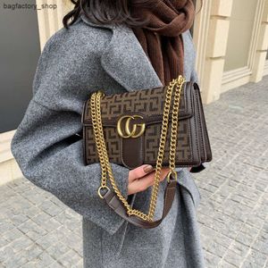 Bolsos de mujer, promoción de fábrica, 50% de descuento, bolsos de diseñador de marca, bolso femenino, cadena nueva, mensajero, estilo extranjero, un hombro