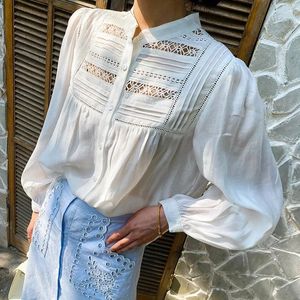 Blouses voor dames Boho geïnspireerd katoenen wit shirt voor vrouwen Hollow Out Pintuck Details Style O-Neck Lange Mouw Tunic Elegant Tops