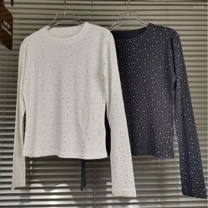 Chemisiers pour femmes Niche à la mode Ajustement mince et chemise à fond amincissant Haut élégant polyvalent Col rond Pull T-shirt pour les femmes