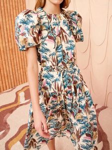 Blouses pour femmes Floral Print Suits à manches bouffantes Bonnes O à col ou à cordon de crampon élastique plissée de jupe midi de jupe 2024