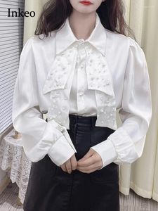 Blouses pour femmes Luxury Pearl Perle Shirt Satin Bow Tie Blouse Femme 2024 Collection Élégante Champe à manches longues Blanc Vêtements Chic INKEO