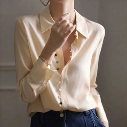 Chemises de chemisiers pour femmes 2024 Silk Slve Long Slve Femmes Bouton coloré Colon