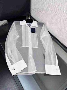 Chemisiers pour femmes Chemises designer 23 Printemps/Été Mode Lettre Triangle Panneau Manches longues Organza Légèrement Transparent Mulberry Silk Shirt Top XXCO