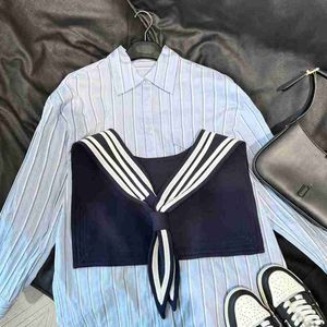 Blusas femininas camisas de grife manto pequeno bolso ombro camisa listrada vertical primavera/verão 2023 novo colarinho polo estilo marinho manga longa CTLM