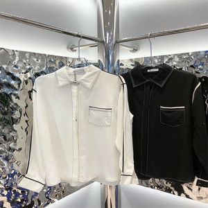 Chemisiers pour femmes chemises début du printemps petit vent parfumé lettre broderie manches longues revers chemise en coton et lin industrie lourde personnalisé