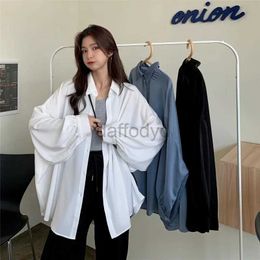 Chemises de chemisiers pour femmes printemps été 2021 Femme chemise surdimensionnée Blouses élégantes pour femmes Lanterne Shirt White Shir mi-longueur manteau femme tunique 240411