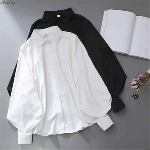 Chemises pour femmes chemises blanches chemises à manches lanternes lâches repeuples simples concept de chemise solide à la mode coréenne ol chemise topl2405