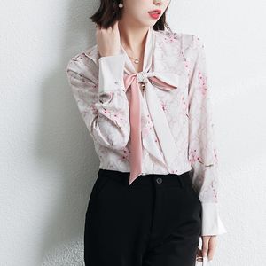 Blouses voor dames shirts vrouwen 2023 lente bedrukte veter mode boog elegante bloem vrouwelijke kleding lange mouwen top ol