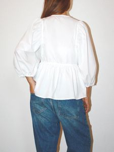 Blouses pour femmes Femmes Y2k Peplum Shirt Puff Sleeve Sleeve Tie Front Ruffle Hem Tops Teen Girl Lace Up Babydoll Crop Top Summer