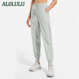 AL0LULU, pantalones de Yoga informales para mujer, cuerpo para mujer, pies con cordón, pantalones sueltos para correr, pantalones deportivos de bolsillo