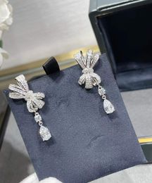 Women's Crystal Tilda Bow Knot Dange oorbellen 925 Sterling Silver Zirkoon Boog Earring Wedding Sieraden Water Drop Tassel Design