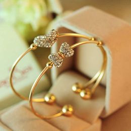 Dames schattig elegant hart en strik manchet armband armbanden kristal charmante accessoire roteerbare fijne pols sieraden Q0719