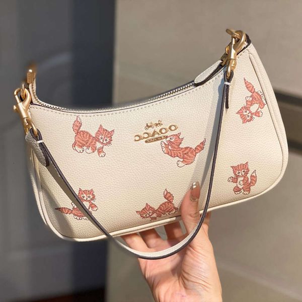 Bolsos de diseñador para mujer Tote 2023 Aolai's New Cute Cat Print Teri Armpit Mahjong Lychee Grain Cowhide Hand Factory Ventas directas