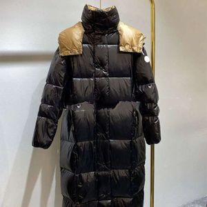 Veste à la veste pour femmes conçue hiver épaissis des vêtements d'extérieur longue à capuche à capuche chaude porte un manteau de marque veste en vent