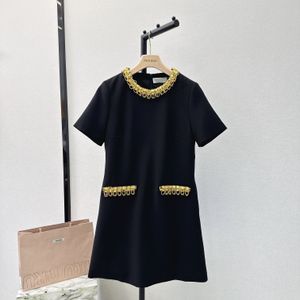 Damesjurken Europees Modemerk Zwart Crew Nek Korte mouwen Mini -jurk