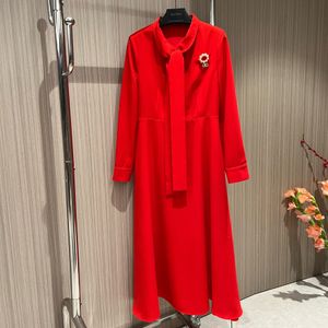 Damesjurken Europees modemerk Halflange jurk met rood lint en lange mouwen