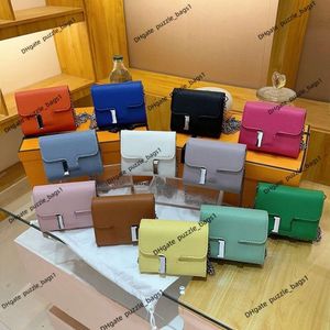 Tienda de bolsas de moda para mujeres 90% de fábrica Ventas calientes Al por mayor de cuero de cuero solo hombro cruzado de mano de carpeta de carpas de lujo de diseño de lujo portátil de bolsas cuadradas pequeñas