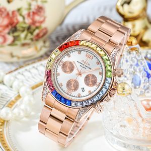 Damesmode regenboogring drie ogen diamanten kalender vrije tijd stalen riem waterdicht quartz horloge
