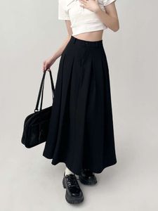 Jupes plissées rétro pour femmes 2023 printemps Nouveau taille haute noire longue gothique grande taille à mi-longueur une jupe de ligne