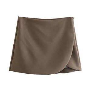 Minifalda de color sólido a la moda para mujer, falda sexy de bolsillo de cintura alta, estilo de diseñador, falda de viajero de temperamento femenino a principios de primavera 2024