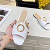 Pantoufles plates pour femmes Été Nouveau cuir sandales de boucle de mode confortable