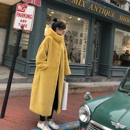 Abrigo de piel de imitación de visón elegante para mujer, largo y esponjoso, holgado, grueso, moda femenina de invierno, Corea con capucha
