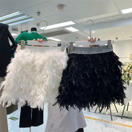 Mini-jupe courte patchée en plumes de fourrure d'autruche véritable taille haute élastique pour femmes