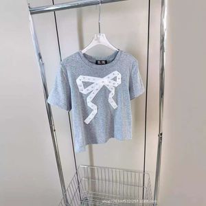 Sweats à capuche pour femmes Sweatshirts Année printemps / été design de niche de niche autocollants à arc faits à la main pour réduire le t-shirt à manches à manches courtes pour fille à l'âge