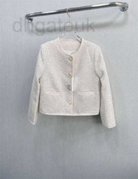 Chaquetas de mujer Diseñador 2023 Otoño / Invierno Nuevo Elegante Pequeño Estilo Fragante Metal Single Breasted Bead Punto Crema Blanco Abrigo corto W1ZK