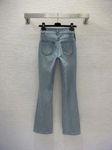 Jeans pour femmes 2023 Automne Bleu clair Taille haute Slim Fit Design Sense Bootcut Split Femme