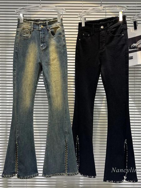 Jeans féminins 2024 AUTUMN RIVET SLIT SLIT-ATTAGE SCHINAGE FLARE PANTER