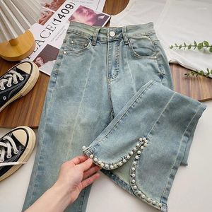 Damesjeans 2024 Retro denim broek vrouwelijke Hight Taille Fashion Split Gared Button Slim Wide Leg Trouser Women Casual Long Flare