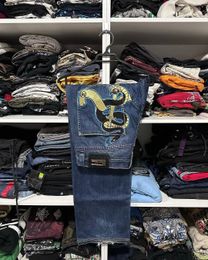 Jeans pour femmes American street hip hop vêtements d'extérieur poche serpent dague impression mode jeans amples Harajuku Y2K pantalon taille haute pour hommes et femmes 231201