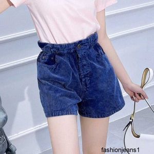 Damesjeans Correcte versie van 24 vroege lente M Miao mode tailleband bloemknop taille shorts patch geborduurde corduroy jeans 884V