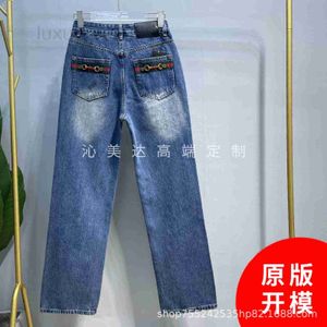Dames jeans ontwerper 23 vroege lente nieuwe achterzak rood en groen lint ketting paard street buckle high taille rechte jeans vrouw QSCQ