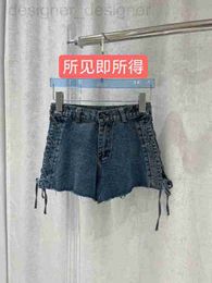 Jeans femininos marca de designer 2023 primavera/verão novas alças laterais picante estilo menina cintura alta magro moda versátil perna larga shorts jeans para mulheres dipl