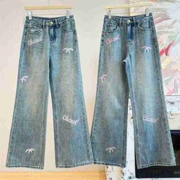 Brand de créateur de jeans pour femmes à la mode droite 24ch printemps Nouveau pantalon long à imprimé brodé
