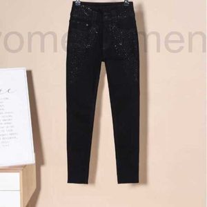 Jeans pour femmes Designer taille haute mince velours denim pour femmes été 2022 nouveau trois boutons ajustement mince et amincissant leggings D742 RWW9