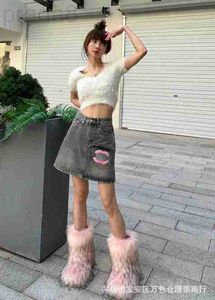 Jeans pour femmes designer Nanyou haute qualité 2023 printemps/été nouvelle petite poche parfumée rose broderie fleur taille polyvalente Denim jupe courte pour femmes YZ9J