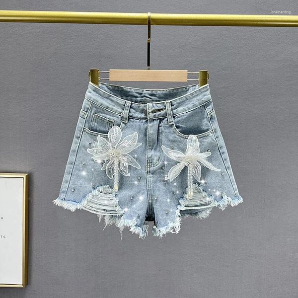 Pantalones cortos de mezclilla de diamantes de jeans femeninos 2024 agujeros de verano azul jean corto jean bordado a- a- line pantalones