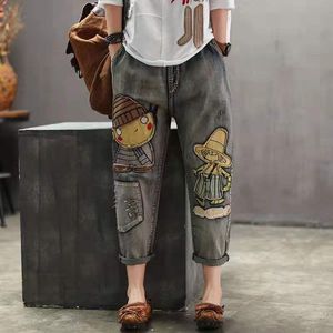 Pantalones vaqueros de mujer Harajuku bordado étnico viento mujer agujero estampado dibujos animados rasgado cintura elástica rábano Denim Harem pantalones de talla grande