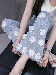 Jeans pour femmes coréense de l'industrie lourde lourde brodée micro flare femme trompette longueur pantalon denim élégant pantalon perlé 2024