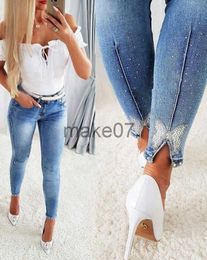 Pantalon de jeans pour femmes pour femme 2023 Nouvelle strass de papillon perlé Split Hem Skinny Jeans sans ceinture Allmatch Denim pantalon J230818