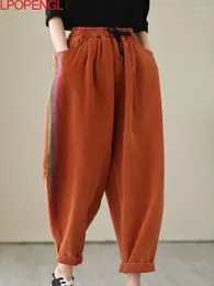 Jeans pour femmes printemps rétro vertical à rayures à rayures de couleur de couleur de couleur pantalon harem décontracté pantalon élastique pantalon littéraire