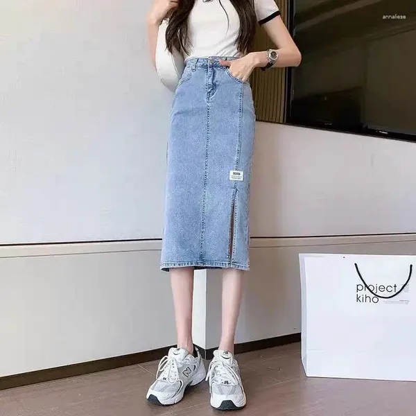 Jeans féminins Summer rétro haute taille une ligne denim jupe à demi-longueur dame commut la version coréenne des fesses de jambe droite enveloppées