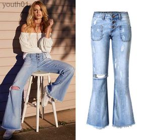 Jeans pour femmes Gros-Jeans pour femmes Lâche Ripped Hole Poche à pompon Bouton Pantalon large de luxe Mode Punk Jeans bleu pour femme de bonne qualité 240304