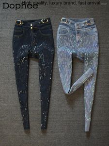 Jeans pour femmes hiver 2023 taille haute boucle en métal pleine couleur du corps rayé strass brillant femmes streetwear stretch denim pantalon