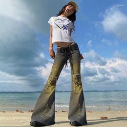 Jeans pour femmes 2024 Summer Y2k rétro Millennium Spicy Girls Street Low Encre Cut Hole Lace Up Up Denim Flare Pantal