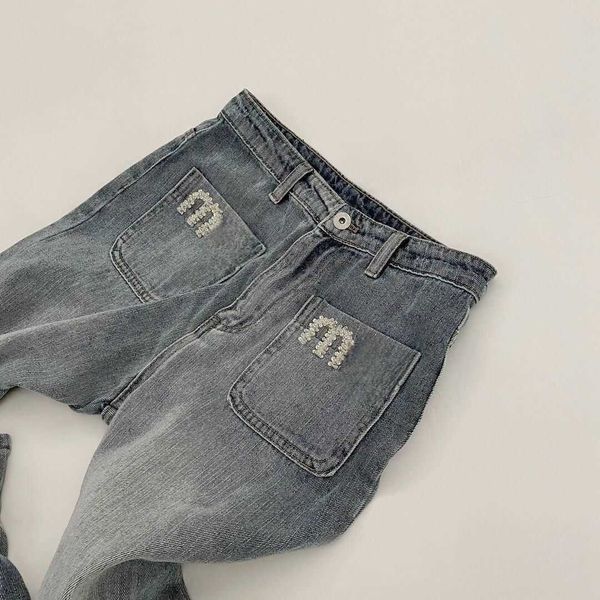 Jeans de mujer Ropa Jeans de diseñador Bolsillo Taladro de uñas Carta Pantalones de mezclilla bordados Primavera Cintura alta Piernas anchas Jeans desgastados