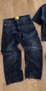 Damesjeans Y2K Streetwear Nieuwe flaggy jeans vrouwen zwarte geborduurde retro gescheurde jeans voor dames hiphop harajuku high taille jeans 240423